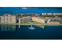 Stunning aerial view of waterfront condos with a private pool and boat dock at 5108 Brittany S Dr # 607, St Petersburg, FL 33715