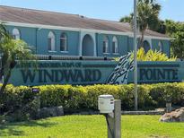 Attractive condominium complex sign with lush landscaping at 11432 Bay Ne St # 11432, St Petersburg, FL 33716