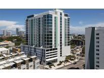 Modern high-rise condo building with floor-to-ceiling windows and glass balconies, offering city views at 777 3Rd N Ave # 1501, St Petersburg, FL 33701