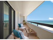 This cozy balcony features stunning ocean views, comfortable seating, and a peaceful atmosphere at 1460 Gulf Blvd # 1206, Clearwater Beach, FL 33767