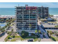 A waterfront condo features panoramic ocean views, a tennis court, and ample parking, creating a luxurious living experience at 7600 Bayshore Dr # 1206, Treasure Island, FL 33706