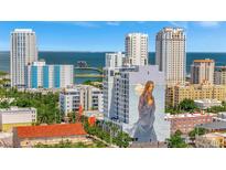 Wonderful city view of the skyline and Tampa Bay with a colorful mural and blue skies at 226 5Th N Ave # 605, St Petersburg, FL 33701