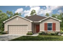 Charming single-story home featuring a two-car garage, neutral stucco exterior, and a well-manicured lawn at 13478 Tropical Breeze Way, Hudson, FL 34669