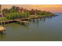 Waterfront condos provide access to serene docks perfect for a relaxing day on the water at 2746 Via Tivoli # 135A, Clearwater, FL 33764