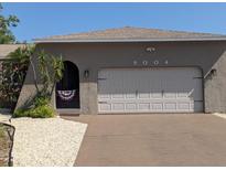 Charming single story home featuring neutral paint, two car garage, and beautiful landscaping at 8004 25Th W Ave, Bradenton, FL 34209