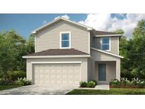 Charming two-story home with a manicured lawn, attached two car garage, and neutral color palette at 12466 Gust Ct, Hudson, FL 34669