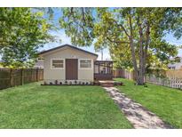 Charming home featuring a well-manicured lawn, inviting entryway, and mature landscaping at 3936 10Th N Ave, St Petersburg, FL 33713