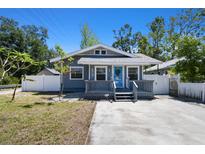 Charming single-Gathering home with a well-manicured lawn and a lovely front porch at 6939 3Rd N St, St Petersburg, FL 33702