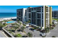 Stunning beachfront condo building with a pool, parking, and beautiful ocean views at 1480 Gulf Blvd # 103, Clearwater Beach, FL 33767