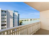 Relaxing balcony view overlooking the ocean, bridge and scenic coastline under clear blue skies at 450 Treasure Island Cswy # 505, Treasure Island, FL 33706