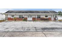 Charming building featuring a parking lot and inviting brick facade at 5330 77Th N St, St Petersburg, FL 33709