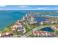 Beautiful aerial view of waterfront condos, meticulously landscaped grounds, and stunning ocean views at 6357 Bahia Del Mar Blvd # 111, St Petersburg, FL 33715