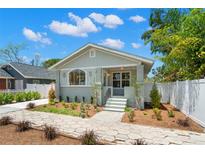 Charming single-story home with well-manicured front yard and inviting entryway at 422 24Th N St, St Petersburg, FL 33713