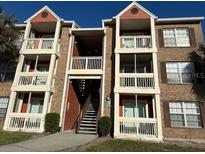 Multi-story condo building featuring balconies and brick facade, offering comfortable community living at 10200 Gandy N Blvd # 1133, St Petersburg, FL 33702