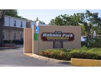 Community sign at Habana Park Condominiums features North Entrance and beautiful landscaping at 4724 Michael Ct # 122, Tampa, FL 33614