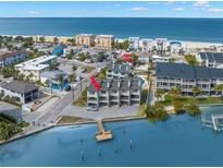 Waterfront townhouse with private dock, beach access, and coastal charm at 9901 1St E St # D, Treasure Island, FL 33706