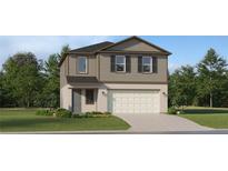 Two-story home with a two-car garage, neutral siding, and well-maintained landscaping at 2292 Blue Grosbeak Pl, Wimauma, FL 33598