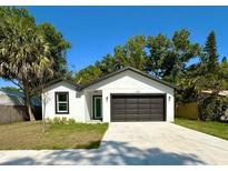 Charming single-story home featuring a well-maintained lawn and inviting curb appeal at 5105 68Th N Way, St Petersburg, FL 33709