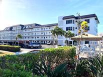 Well maintained condo complex featuring a bright exterior and ample parking at 5960 30Th S Ave # 414, Gulfport, FL 33707