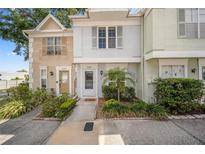 Charming townhome with well-kept landscaping and inviting front entrance at 11357 Stratton Park Dr # 11357, Temple Terrace, FL 33617