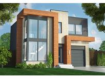 Contemporary two-story home featuring a modern design, clean lines, and large windows at 91 Avonwood, Tampa, FL 33625