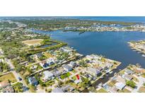 Waterfront property featuring canal access, community docks and a beautiful waterfront community at 5425 Bluepoint Dr, Port Richey, FL 34668
