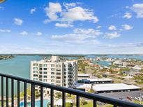 High-rise waterfront condo with city view, pool, and convenient covered parking at 736 Island Way # 1101, Clearwater Beach, FL 33767