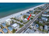 Stunning aerial view of Beachside Villas near the beach and ocean, showcasing its prime location at 1500 Gulf Blvd # 103B, Indian Rocks Beach, FL 33785