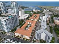 Stunning aerial view showcasing the community, marina, and cityscape in a desirable coastal location at 200 4Th S Ave # 303, St Petersburg, FL 33701
