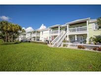 Charming townhomes with private patios, balconies, and lush landscaping offer a serene outdoor living experience at 4816 Snook Se Dr # F, St Petersburg, FL 33705