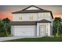 Charming two-story home with a two-car garage and covered entry offers a welcoming facade and tropical landscaping at 9765 Crescent Moon Dr, Riverview, FL 33578