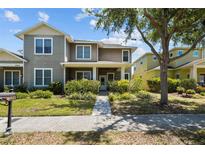 Charming two-story home with welcoming curb appeal and beautifully landscaped front yard at 6922 Duffy Ln, Tampa, FL 33616