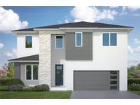 Modern two-story home showcasing stone accents, clean lines, and a well-manicured lawn at 3310 W Rogers Ave, Tampa, FL 33611