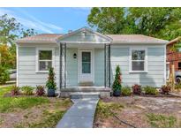 Charming single-story home with a well-manicured front yard and covered entry for added curb appeal at 1419 55Th S St, Gulfport, FL 33707