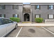 Condo complex exterior featuring classic architectural details and neat landscaping at 3824 Cortez Dr # B, Tampa, FL 33614