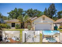 Charming single-story home with a well-manicured lawn, mature trees, and a two-car garage at 1916 Sandstone Pl, Clearwater, FL 33760