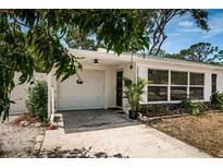 Well-maintained home featuring a convenient carport and charming curb appeal at 8054 38Th N Ave, St Petersburg, FL 33710