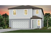 Charming two-story home with a two-car garage, light gray siding, and tropical landscaping at 9951 Trellis Vine Way, Parrish, FL 34219