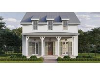 Charming two-story home features a covered porch with columns and classic design at 510 35Th N Ave, St Petersburg, FL 33704
