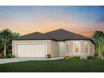 Beautiful single-Gathering home with a two-car garage, lush landscaping, and a warm and inviting curb appeal at 9950 Trellis Vine Way, Parrish, FL 34219