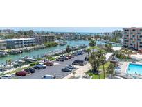 Beautiful waterfront property with boat docks, parking, swimming pool and ocean views at 1 Key Capri # 608E, Treasure Island, FL 33706