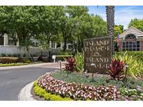 Beautifully landscaped entrance sign for Island Place Island Walk Condominiums, gated for privacy and security at 716 Seagate Dr # 716, Tampa, FL 33602