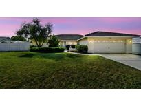 Well-maintained lawn, manicured shrubs, and a charming one-story home create a welcoming curb appeal at 14078 Leeward Dr, Seminole, FL 33776