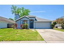 Charming single-Gathering home with a well-maintained lawn and inviting curb appeal at 2486 Hickman Cir, Clearwater, FL 33761