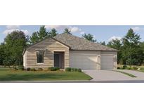 Charming single-story home with a two-car garage, stone facade, and well-manicured lawn, inviting and full of curb appeal at 9590 Runaway Breeze Dr, Land O Lakes, FL 34637