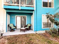 Inviting patio with comfortable seating, perfect for relaxing outdoors at 455 Alt 19 S # 235, Palm Harbor, FL 34683