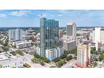 Stunning high-rise condominium building showcasing modern architecture and city skyline views at 777 N Ashley Dr # 402, Tampa, FL 33602
