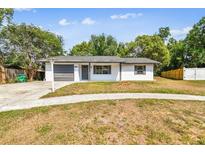 Charming single-story home with a well-maintained lawn and attached one car garage at 5628 Mccoy Ct, Zephyrhills, FL 33542