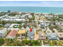 Stunning aerial view of beach homes with easy access to the beautiful ocean, creating a serene coastal living experience at 619 2Nd St # 3, Indian Rocks Beach, FL 33785