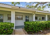 Charming condo featuring a well-kept lawn and tidy front entrance at 11200 102Nd Ave # 48, Seminole, FL 33778